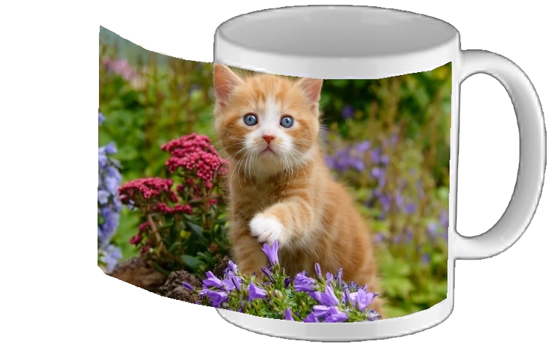 Mug Cute ginger kitten in a flowery garden, lovely and enchanting cat 