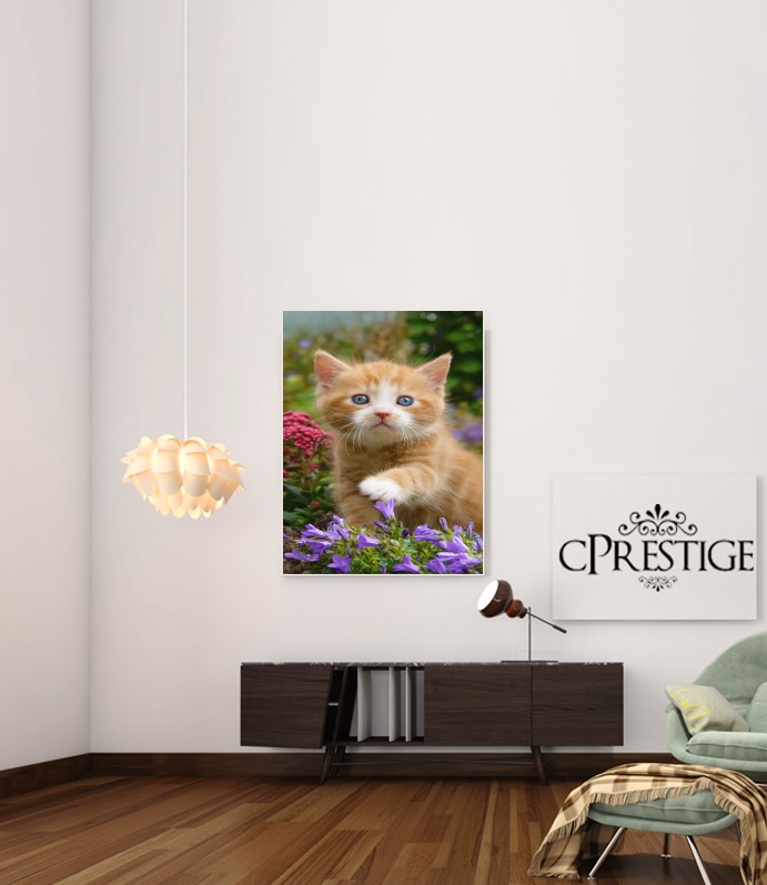 Canvas Cute ginger kitten in a flowery garden, lovely and enchanting cat 